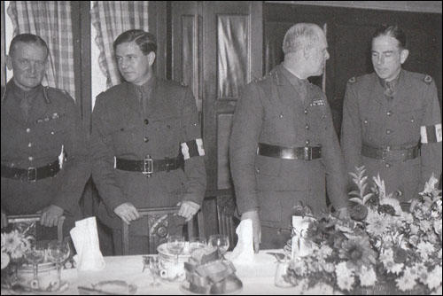 Kim Philby (second from the left) in a British Army uniform. 